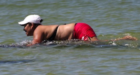 Woman rides manatee in Pinellas beach / Headline Surfer